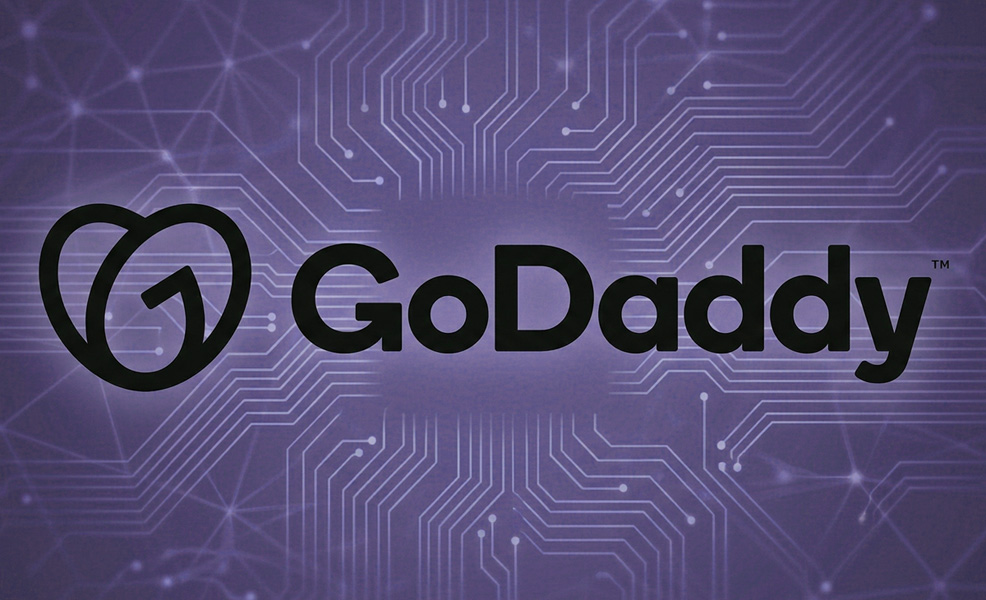 godaddy hosting review logo on tech related background